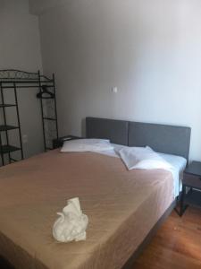 Postel nebo postele na pokoji v ubytování Apollo Hotel
