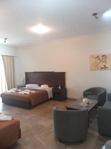 Postel nebo postele na pokoji v ubytování Apollo Hotel
