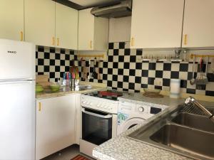A kitchen or kitchenette at Gelso