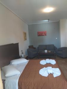 Postel nebo postele na pokoji v ubytování Apollo Hotel