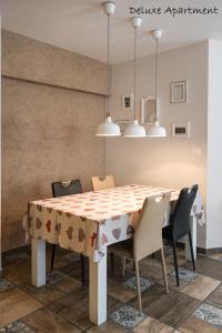 a dining room with a table and chairs at Apartment Villa Carolina in Kranjska Gora