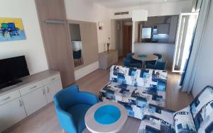 TV a/nebo společenská místnost v ubytování Apartments Villa Loznica