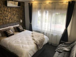 Postel nebo postele na pokoji v ubytování Luxury rooms Lira
