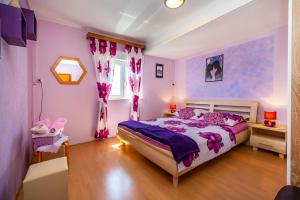 Posteľ alebo postele v izbe v ubytovaní Holiday House K&K