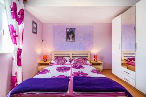 Posteľ alebo postele v izbe v ubytovaní Holiday House K&K