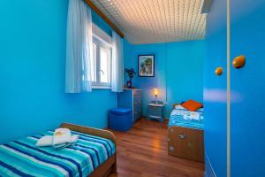 Posteľ alebo postele v izbe v ubytovaní Holiday House K&K
