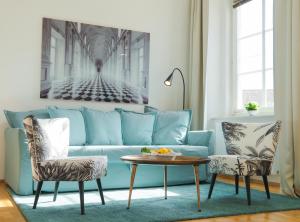 Posezení v ubytování Smile Apartments zur Gozzoburg