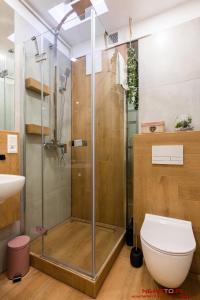 Koupelna v ubytování Apartment Nearto Old Town Daszyńskiego street