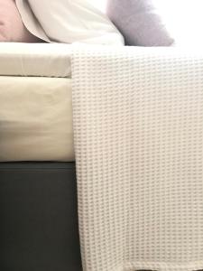 Letto o letti in una camera di Volta Superior Studios