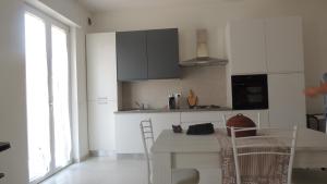 A kitchen or kitchenette at Casa Vacanza MariaTeresa