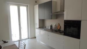 A kitchen or kitchenette at Casa Vacanza MariaTeresa