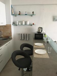 Kuchyňa alebo kuchynka v ubytovaní Sea view apartment