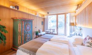 Postel nebo postele na pokoji v ubytování MalisGarten Green Spa Hotel + 37 fotografií