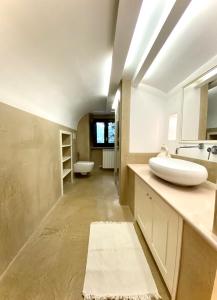Ein Badezimmer in der Unterkunft Trulli Laurus 600