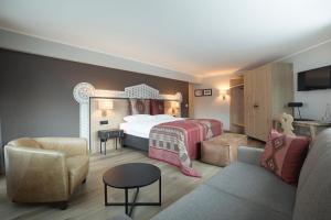 Postel nebo postele na pokoji v ubytování Hotel Steffani