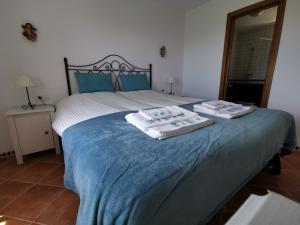 A bed or beds in a room at Casa Ayo