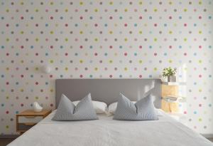 Postel nebo postele na pokoji v ubytování Hotel Madison