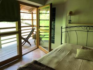 Posteľ alebo postele v izbe v ubytovaní B&B Maso Zont Antico Maso