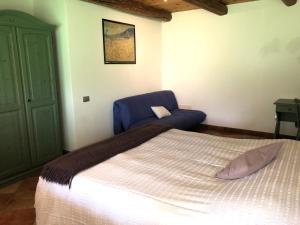 Posteľ alebo postele v izbe v ubytovaní B&B Maso Zont Antico Maso