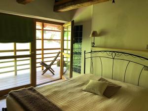 Posteľ alebo postele v izbe v ubytovaní B&B Maso Zont Antico Maso