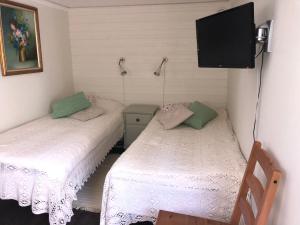 Postel nebo postele na pokoji v ubytování Villa Verdi