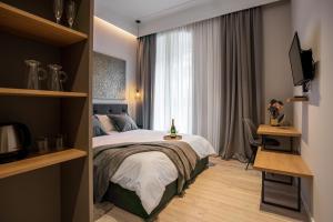 Кровать или кровати в номере Harbour Residence Rooms