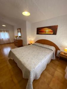 A bed or beds in a room at Casa di Campagna in Gallura