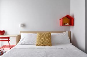 Postel nebo postele na pokoji v ubytování Hotel Madison