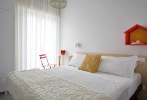Postel nebo postele na pokoji v ubytování Hotel Madison