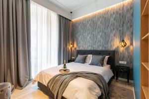 Posteľ alebo postele v izbe v ubytovaní Harbour Residence Apartments