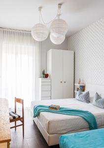 Postel nebo postele na pokoji v ubytování Hotel Madison