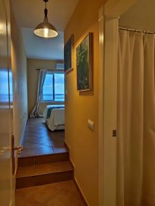 Кровать или кровати в номере CASA LA ISLETA PLAYA