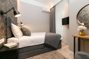 Posteľ alebo postele v izbe v ubytovaní Harbour Residence Apartments