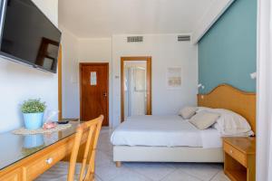 Postel nebo postele na pokoji v ubytování Hotel Mandetta - Adults Only