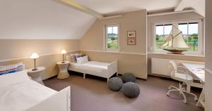 Precise Resort Rügen Apartments & SPLASH Erlebniswelt客房内的一张或多张床位
