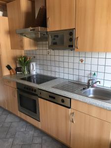 Eldhús eða eldhúskrókur á Appartements Caroline