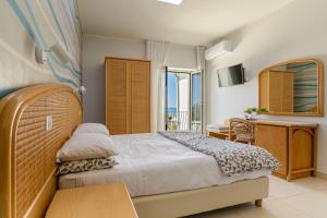 Postel nebo postele na pokoji v ubytování Hotel Mandetta - Adults Only