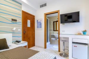 TV a/nebo společenská místnost v ubytování Hotel Mandetta - Adults Only
