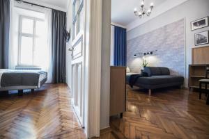 Łóżko lub łóżka w pokoju w obiekcie Bentis Luxury Apartments