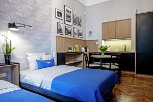 Łóżko lub łóżka w pokoju w obiekcie Bentis Luxury Apartments
