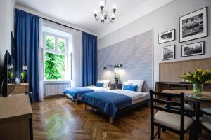 Łóżko lub łóżka w pokoju w obiekcie Bentis Luxury Apartments