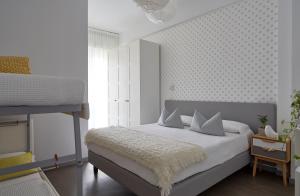 Postel nebo postele na pokoji v ubytování Hotel Madison