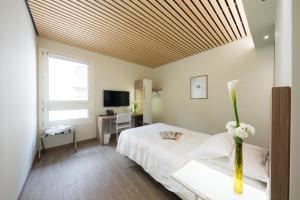 Voodi või voodid majutusasutuse Hotel Marelet toas