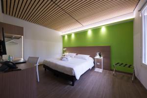 Voodi või voodid majutusasutuse Hotel Marelet toas