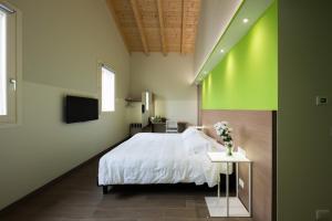 Voodi või voodid majutusasutuse Hotel Marelet toas