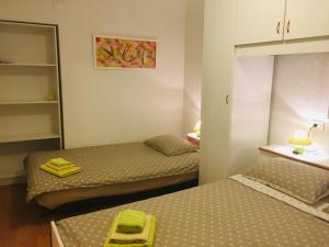 Posteľ alebo postele v izbe v ubytovaní Apartment Filipas