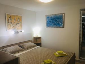 Posteľ alebo postele v izbe v ubytovaní Apartment Filipas
