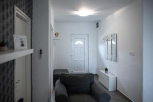 Area soggiorno di Olivér 22 Apartman