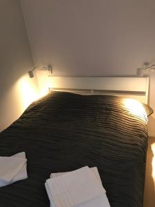 Posteľ alebo postele v izbe v ubytovaní Apartamenty Stary Rynek 25 Oficyna Toruń