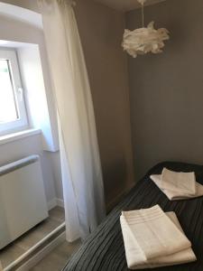 Posteľ alebo postele v izbe v ubytovaní Apartamenty Stary Rynek 25 Oficyna Toruń